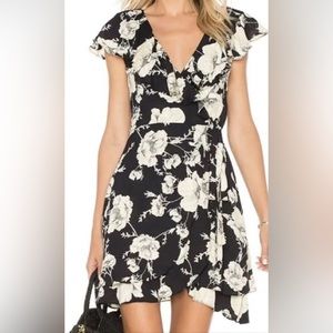Free people, black and white wrap dress. Never worn.